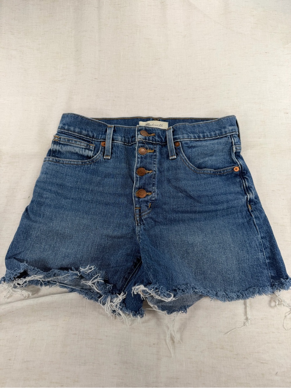 Madewell High-Waist Distressed Denim Shorts in Medium Blue